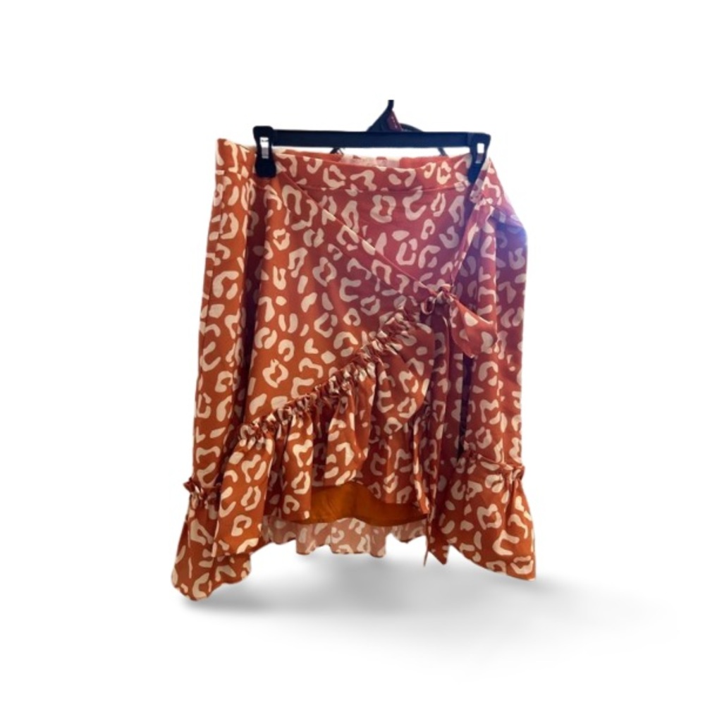 Anthropologie Hutch orange wrap skirt with ruffle. Satin effect with lining.